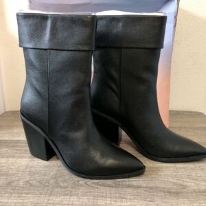 Chic Black Leather Heeled Boots
